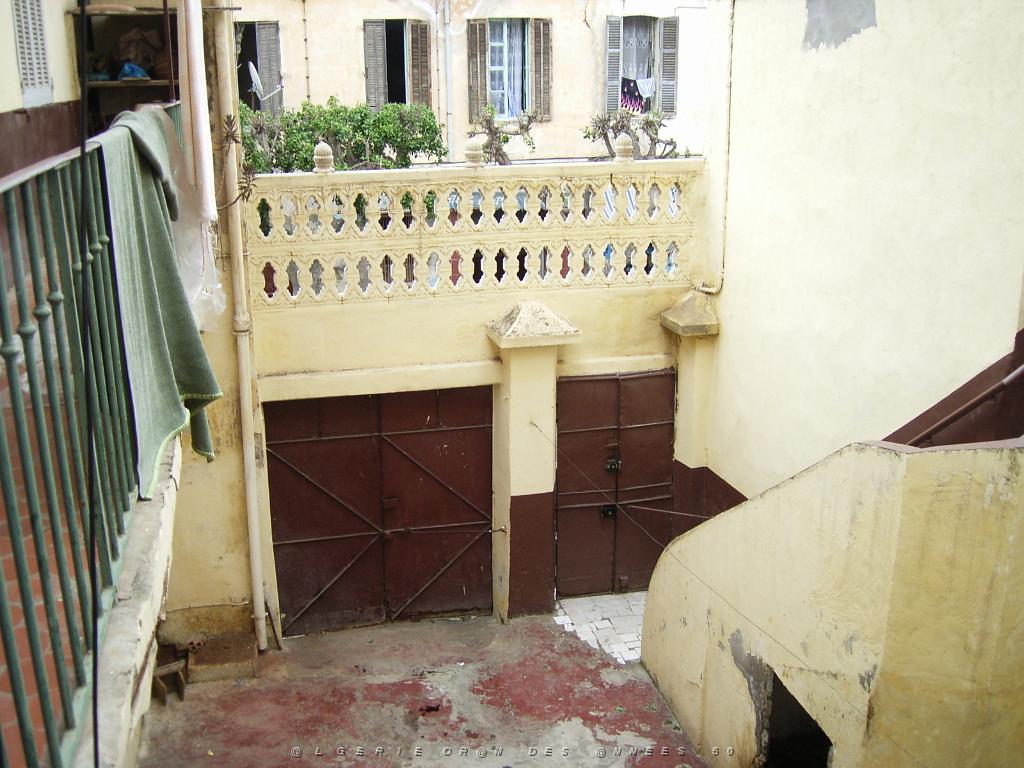 036-ORAN-Juin06-rue du 75.jpg - Unicode